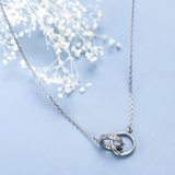 Interlock ring necklace