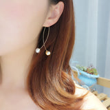 Loop pearls earrings