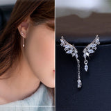 Angel wing ear studs