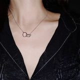 Interlock ring necklace